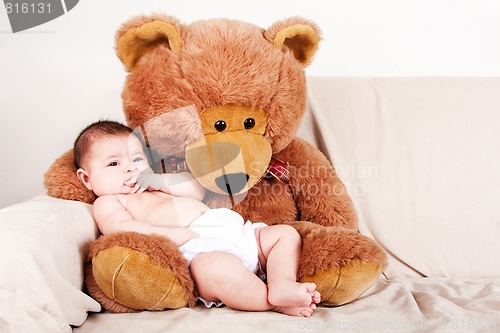 Image of Baby with bear