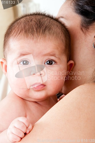 Image of Mother holding baby