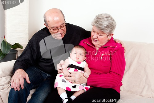 Image of Grandparents with baby girl