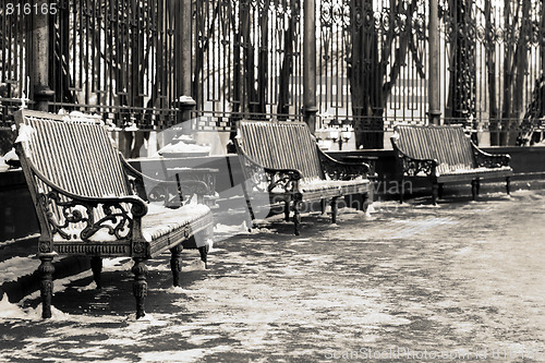 Image of Three benches in a park