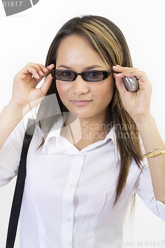 Image of Sreyna white top, sunglasses 1