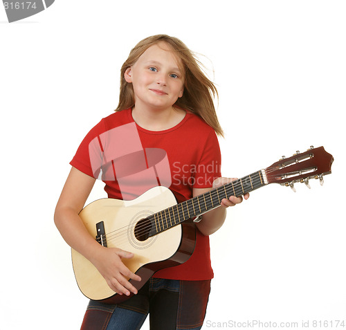 Image of girl playing guitar on white