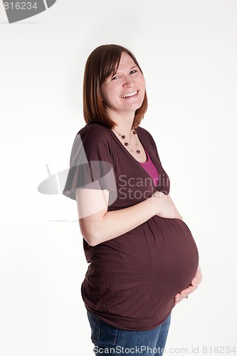 Image of Laughing Pregnant Mother