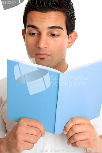 Image of Closeup of a man reading a book