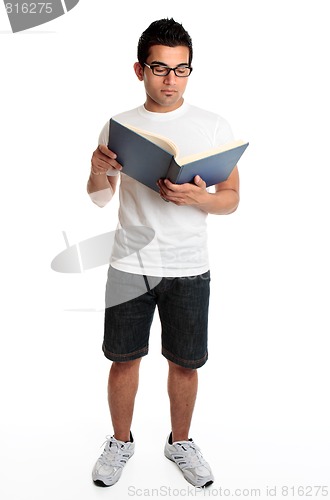 Image of Man reading a hardcover book