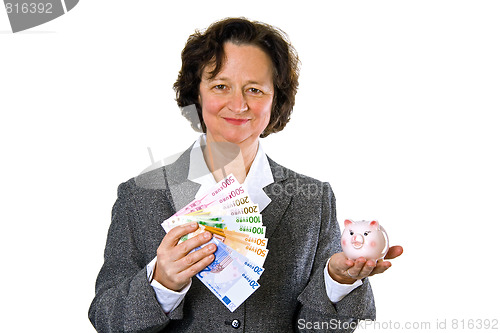 Image of Woman with piggy bank
