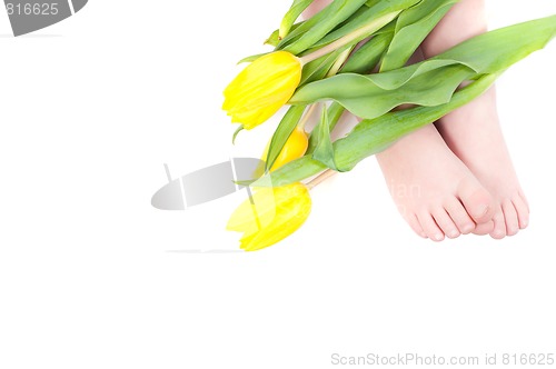 Image of Little girl foots with flowers