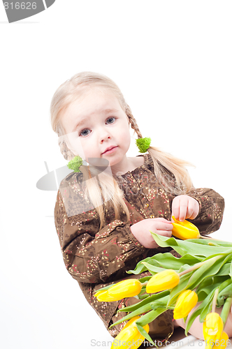 Image of Little girl with flowers