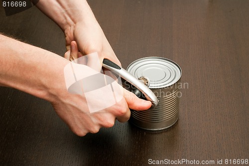 Image of Using can-opener