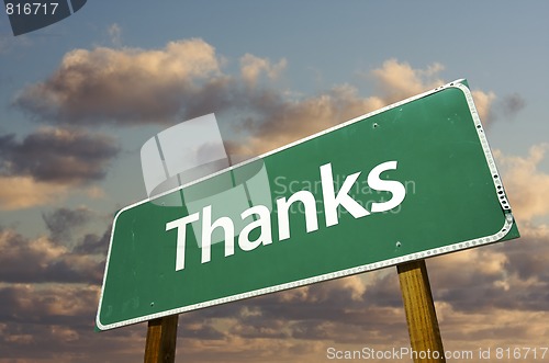 Image of Thanks Green Road Sign Over Clouds