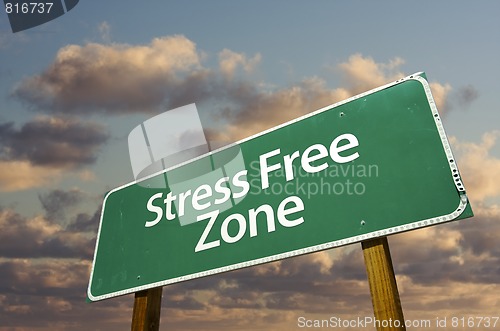Image of Stress Free Zone Green Road Sign and Clouds