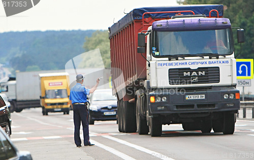 Image of Policeman on the road