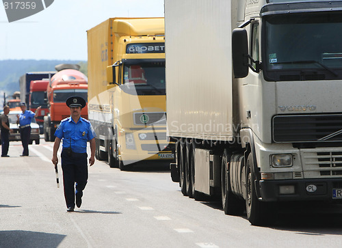 Image of Policeman on the road