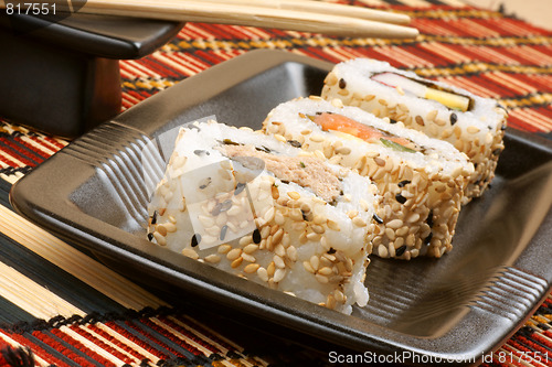 Image of Sushi on a black tray