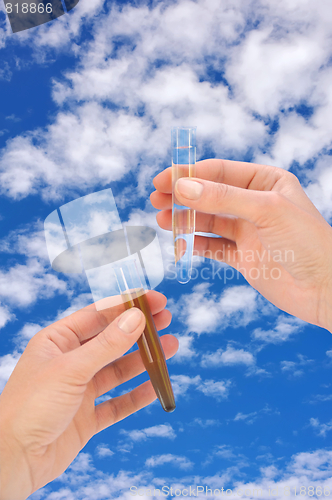 Image of Clean and dirty water samples in hands