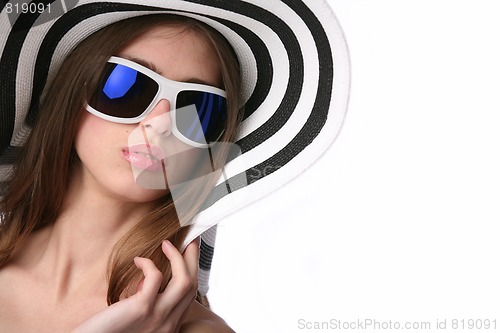 Image of luxury girl in striped hat