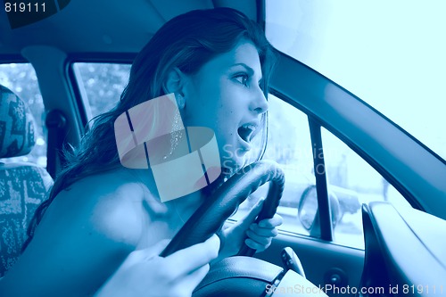 Image of emotional brunette driver