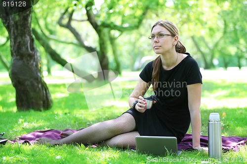 Image of businesswoman in the park