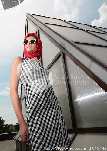 Image of girl in black sunglasses