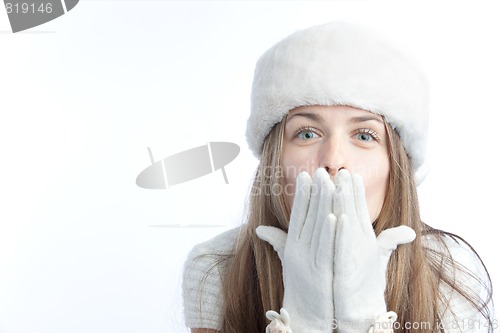 Image of blonde in the white winter hat