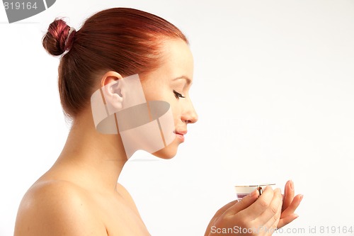 Image of beautiful girl with coffee cup