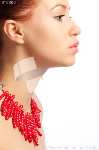 Image of girl with coral necklace