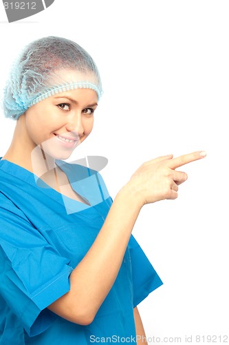 Image of smiling nurse pointing index finger
