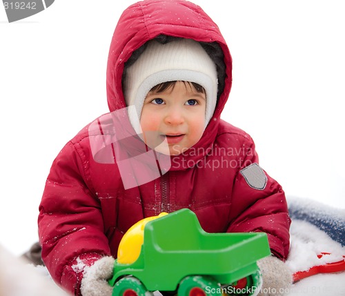 Image of little kid in the red winter jacket