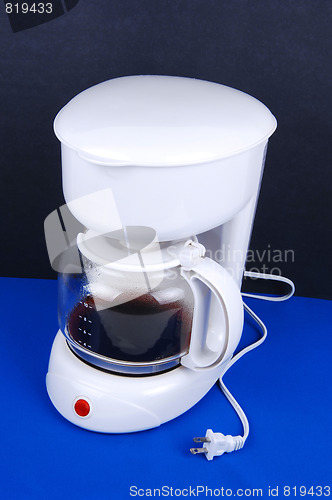 Image of A white coffee maker.
