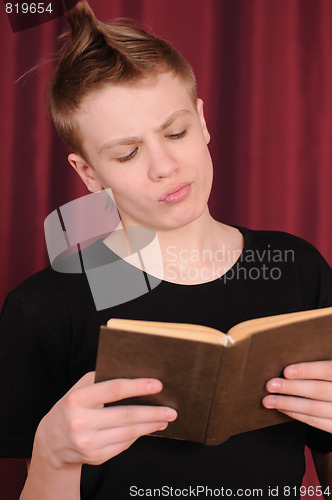 Image of teenager with book