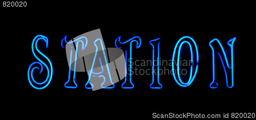 Image of Blue station neon sign