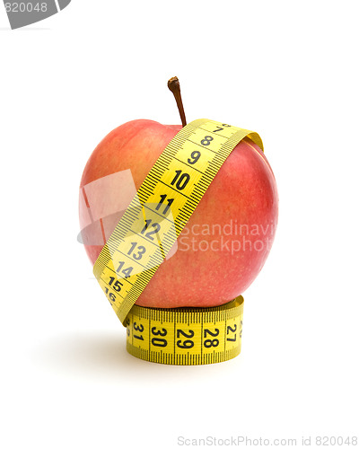 Image of Red apple and measuring tape