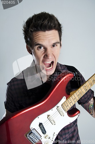 Image of Happy guitar man