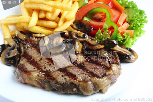 Image of Grilled ribeye steak dinner