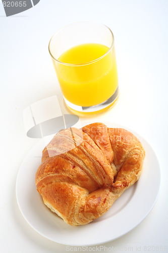 Image of Croissant and juice vertical