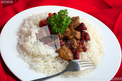 Image of Chili con carne on red cloth