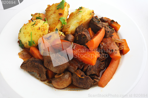 Image of Plate of beef and carrot stew