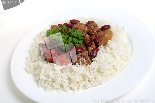 Image of Chili con carne on rice, white background