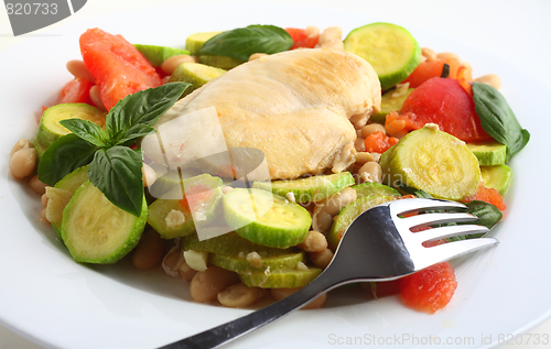 Image of Italian chicken, with zucchini, beans and tomato