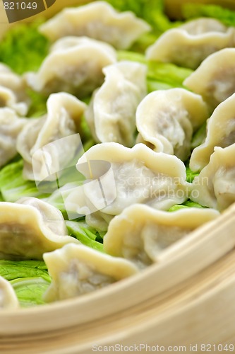 Image of Bamboo steamer with dumplings