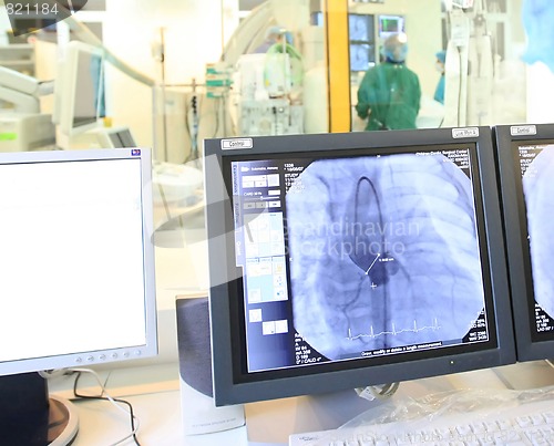 Image of Doctor looking at a computer monitor