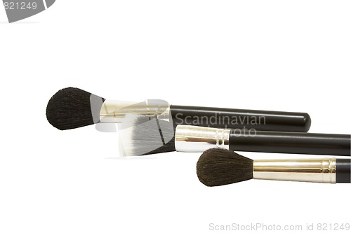 Image of three make-up brushes 