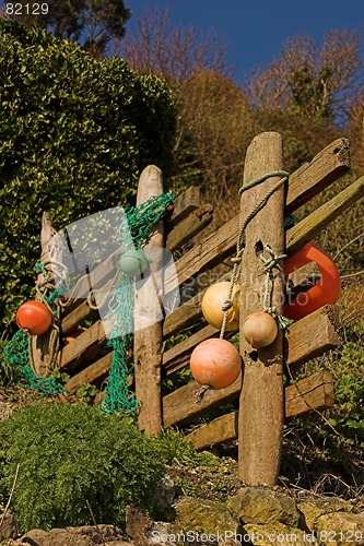 Image of Driftwood fence with floats