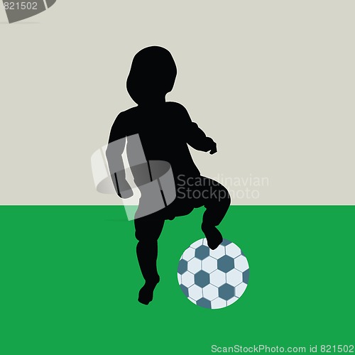 Image of baby playing football