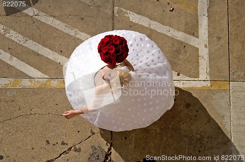 Image of Bride Twirling in Parking Lot