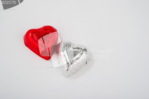 Image of Two Foil Wrapped Heart Shaped Candies