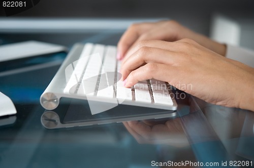 Image of hands on keyboard