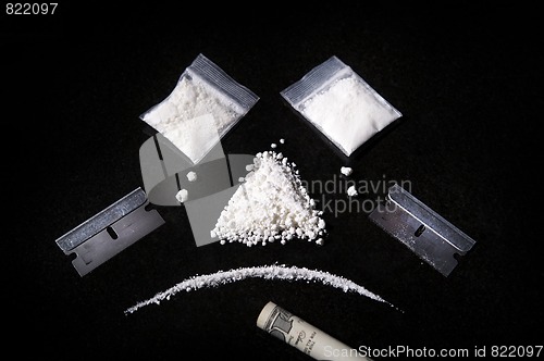 Image of Composition of Cocaine, razor and rolled bill,  Making Sad Face