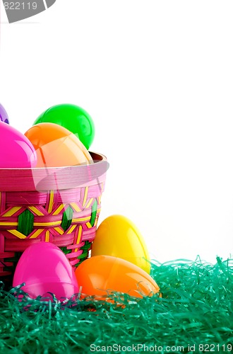 Image of Easter basket with colored eggs