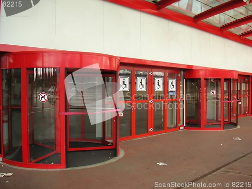 Image of Red revolving doors